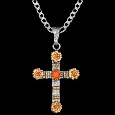A custom silver cross pendant necklace for men and women, western-inspired design. featuring bronze flowers and orange zirconia stone